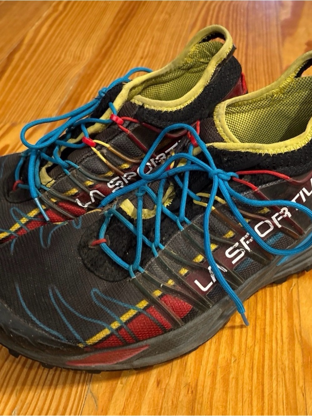 La Sportiva Black Trail Shoes with Blue Laces and Yellow Interior